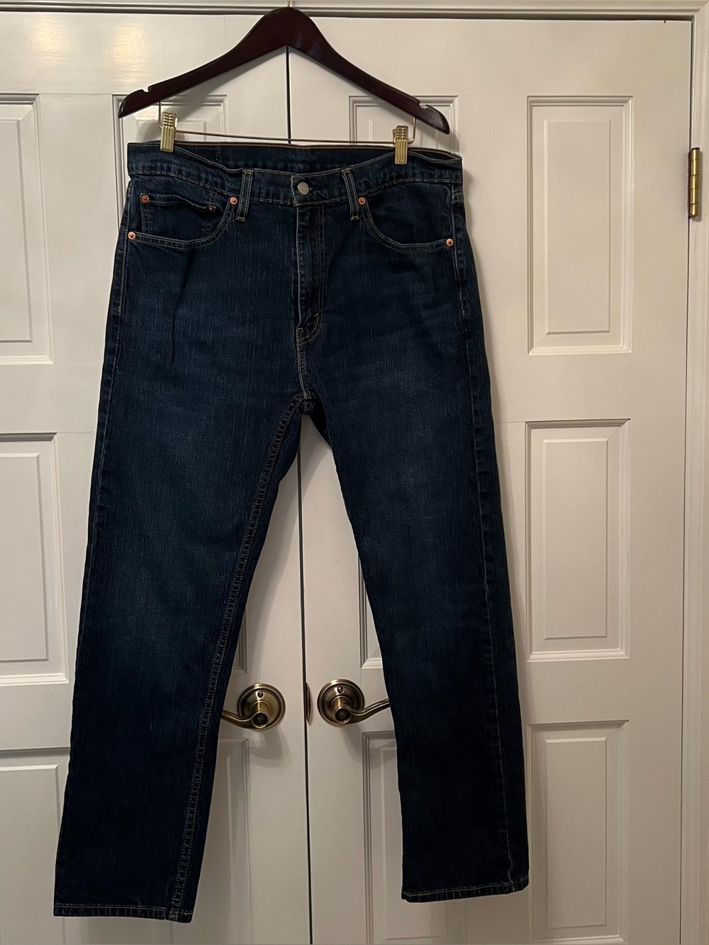 Levi's Men's 505 Relaxed Jeans in Dark Blue with Tan Leather Patch